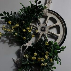Rustic Wheel Wall Decor with Greenery and Yellow Accents 6” around